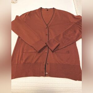 Luxury Designer Rust Cardigan w Navy trim
Worn once